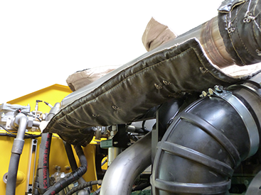 Hitzeschutz und Verbrennungsschutz durch Ummantelung der Abgasrohre mit iSoKlick.INTEGRAL.flex