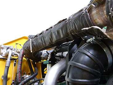 durch Ummantelung der Abgasrohre mit iSoKlick.INTEGRAL.flex, die textile Integraldämmung